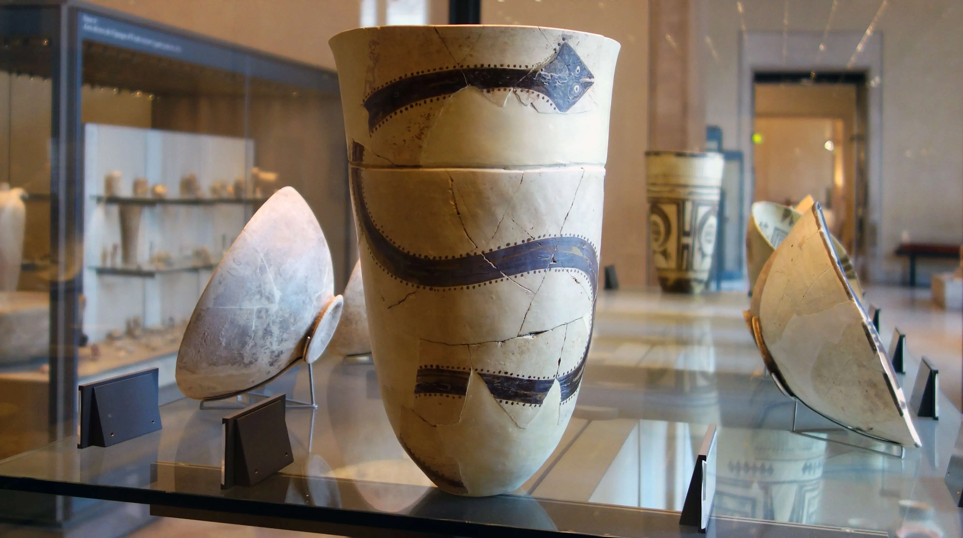 Beaker with snake motif